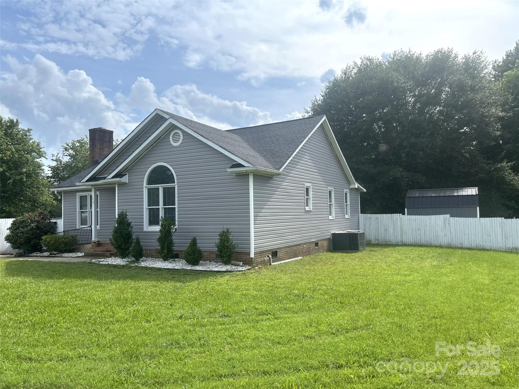 110 Weeping Willow Way Gastonia, NC 28052 - Photo 28 of 28 a front view of house with yard and trees