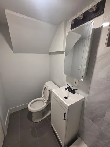 a view of a backyard with sitting area