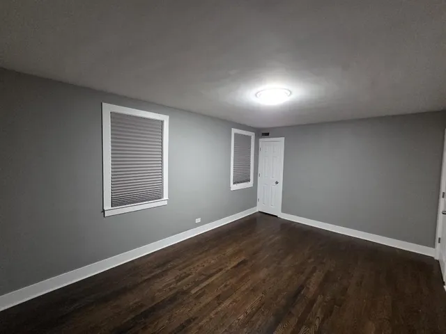 a bathroom with a toilet a sink and bathtub