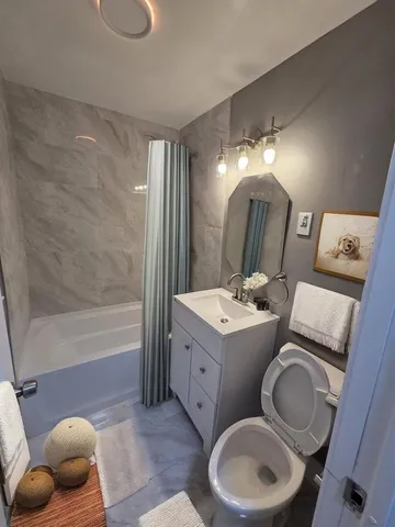 a stove top oven sitting inside of a kitchen