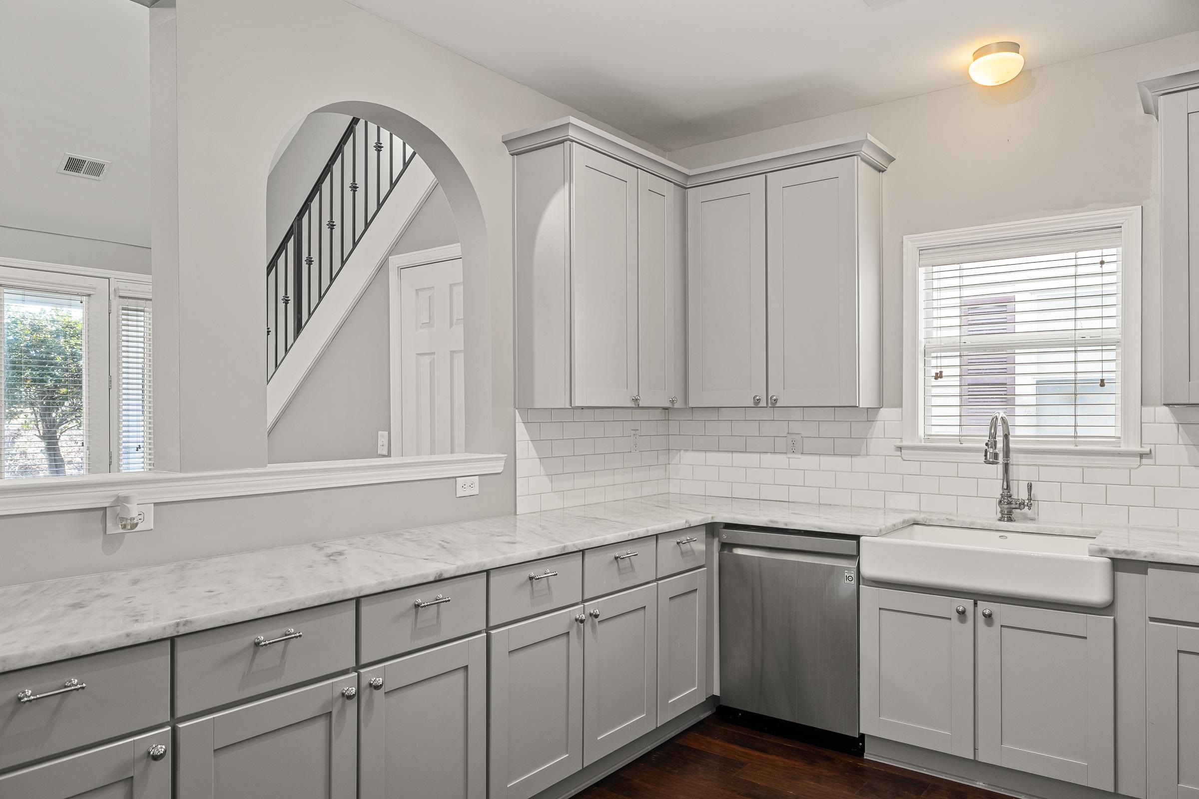 1323 Island Ridge Drive Memphis, TN 38103 - Photo 11 of 29 a kitchen with sink cabinets and window