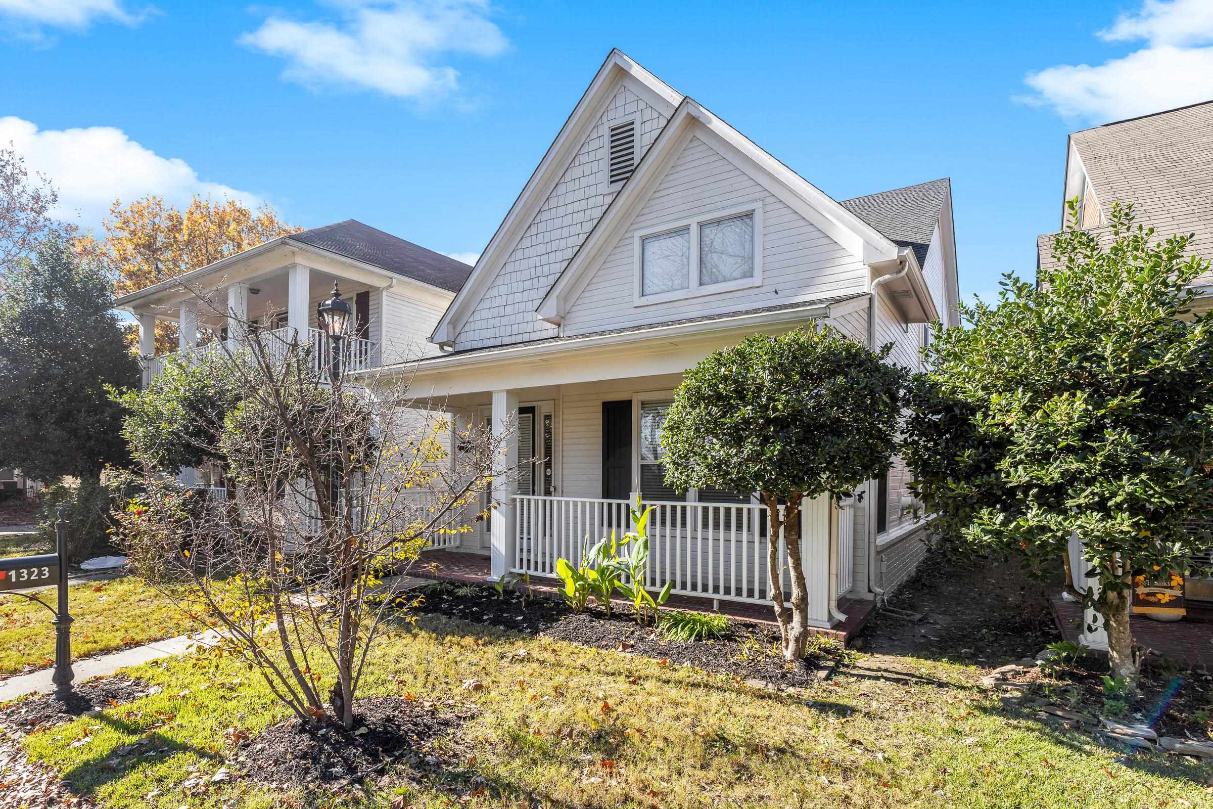 1323 Island Ridge Drive Memphis, TN 38103 - Photo 2 of 29 a front view of a house with a yard