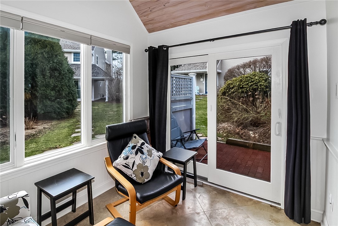 318 Corey Lane, Unit 318 Middletown, RI 02842 - Photo 11 of 31 Sliding Door to brick patio.