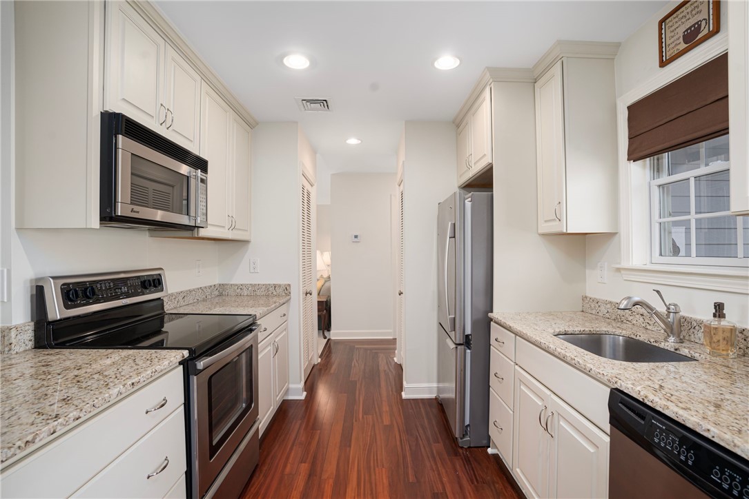 318 Corey Lane, Unit 318 Middletown, RI 02842 - Photo 12 of 31 Updated kitchen has granite counter tops & stainless appliances.