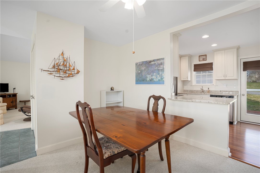 318 Corey Lane, Unit 318 Middletown, RI 02842 - Photo 16 of 31 Dining Room looking back to the Kirthen.