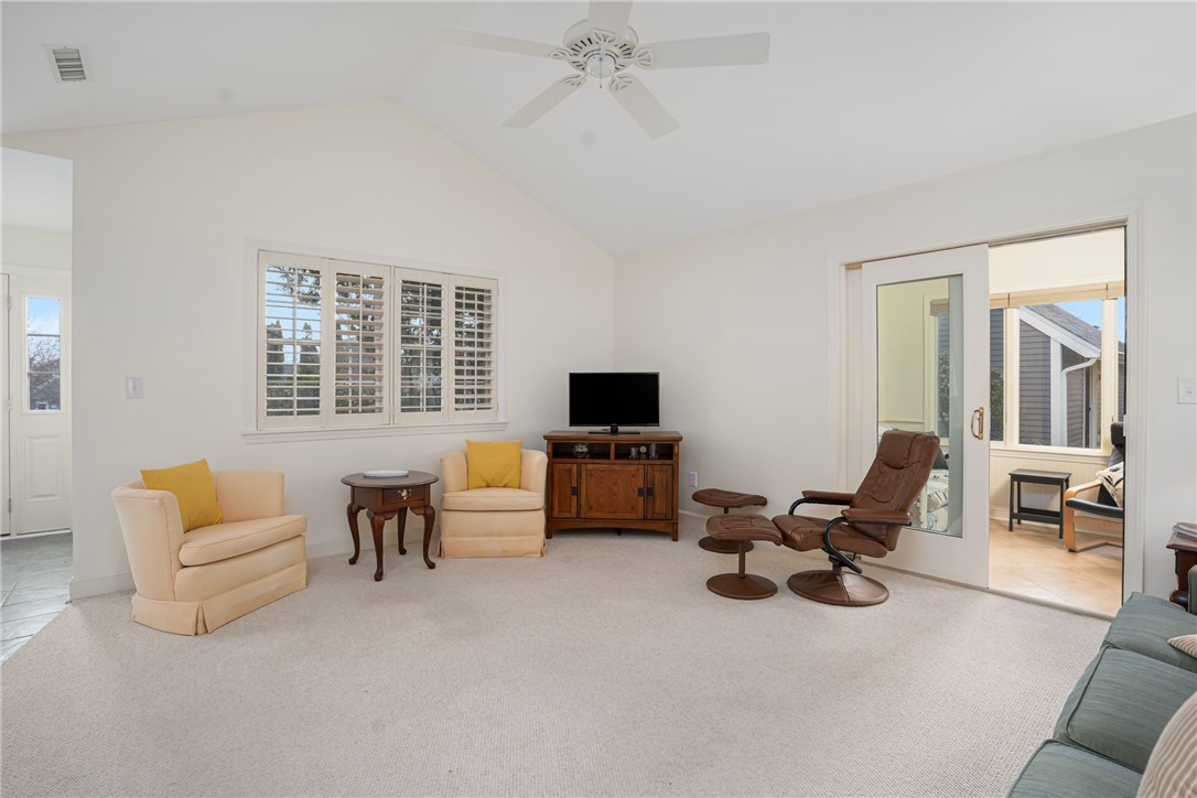 318 Corey Lane, Unit 318 Middletown, RI 02842 - Photo 7 of 31 Living Room with Sun Room beyond