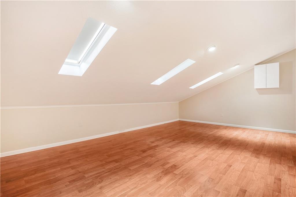 195 Shafer Road Coraopolis, PA 15108 - Photo 12 of 25 Choose your purpose for this large 21x13 flex room with wood style laminate floor with skylights and shades! It is accessible through the master closet. Possibilities are endless; extra office space, play area, exercise area or simply a storage room.