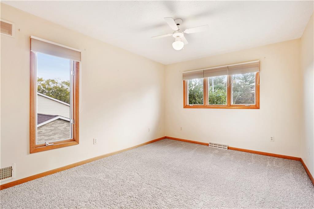 195 Shafer Road Coraopolis, PA 15108 - Photo 13 of 25 Second bedroom with new carpet, double closet with shelves and a ceiling fan.