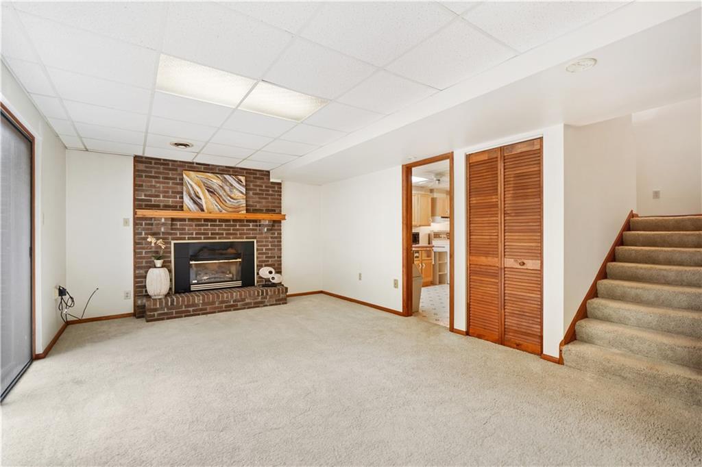 195 Shafer Road Coraopolis, PA 15108 - Photo 16 of 25 Does someone need their own complete living space? This lower level with sliding door to lower deck has its own access and complete with Game Room, full Kitchen, full Bathroom and Bedroom (fourth).