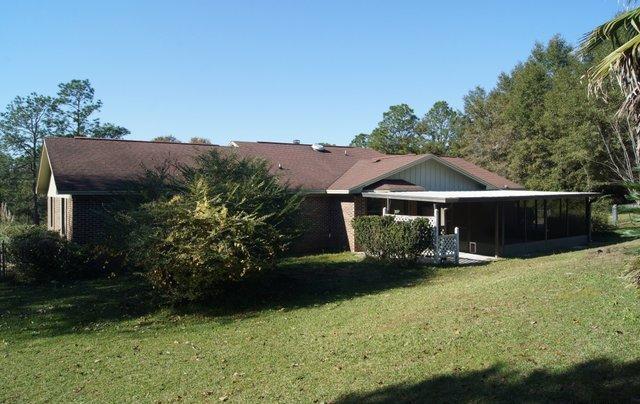 505 Ridge Lake Road Crestview, FL 32536 - Photo 12 of 18 a front view of a house with a yard