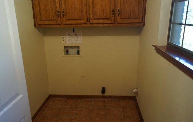 505 Ridge Lake Road Crestview, FL 32536 - Photo 5 of 18 a view of storage and utility room with window