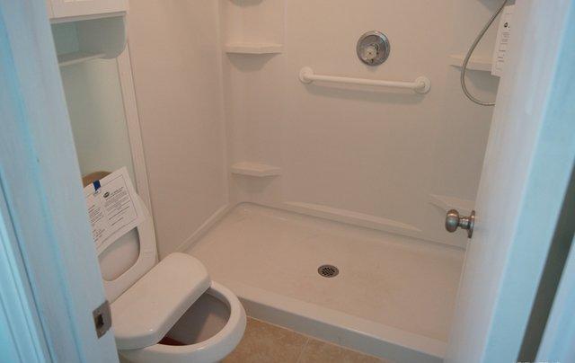 505 Ridge Lake Road Crestview, FL 32536 - Photo 7 of 18 a bathroom with a toilet and a shower