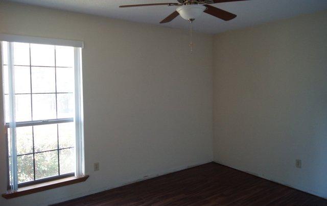 505 Ridge Lake Road Crestview, FL 32536 - Photo 8 of 18 an empty room with a window