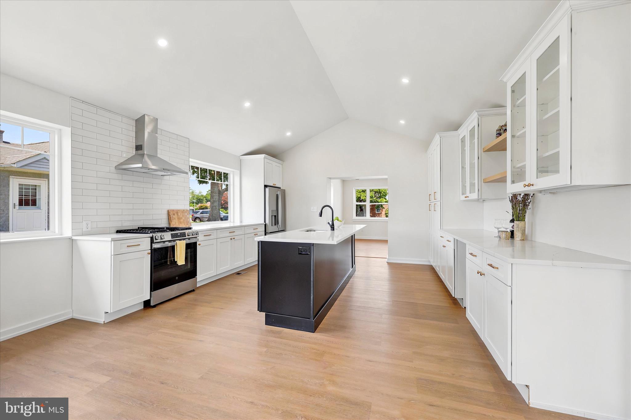 8 James Road Broomall, PA 19008 - Photo 10 of 35 a large kitchen with a large counter top space a sink stainless steel appliances and cabinets