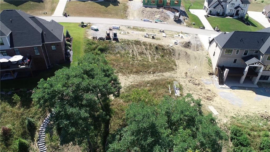 3055 Chestnut Ridge Drive Jefferson Hills, PA 15025 - Photo 7 of 10 an aerial view of a house with yard