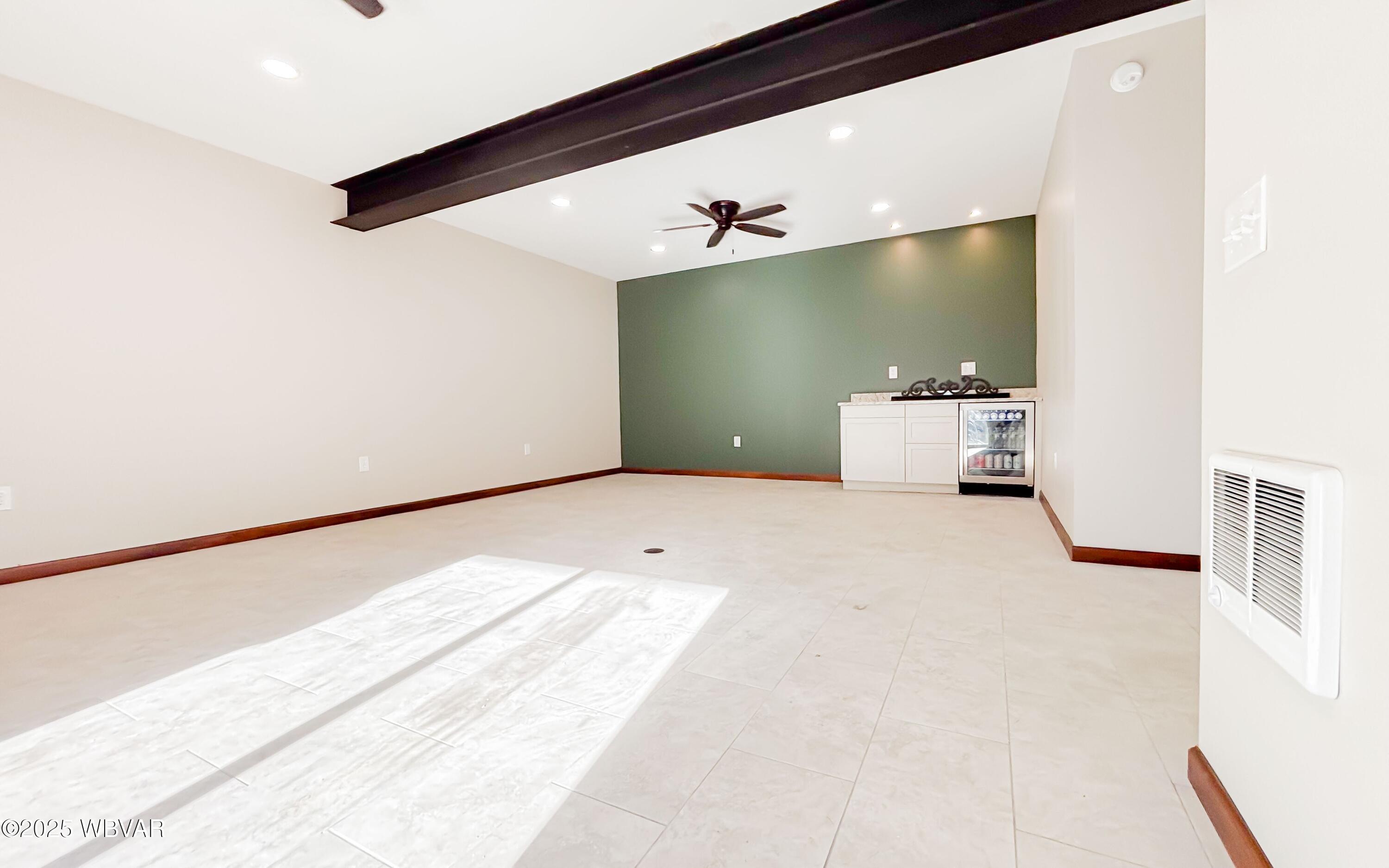 207 Baker Road Trout Run, PA 17771 - Photo 33 of 56 Downstairs Family Room with Wine Cooler