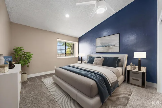 a view of an empty room and fire place