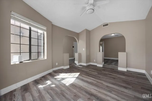 a bathroom with a sink vanity granite and a mirror