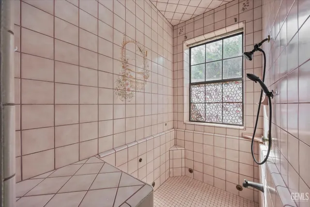 a room with a furniture and a window