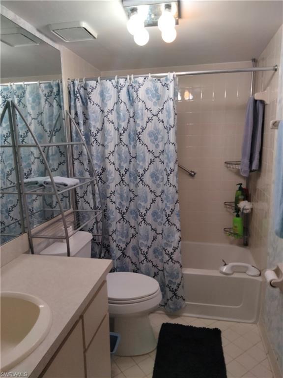 3535 Antarctic Circle, Unit 2302 Naples, FL 34112 - Photo 10 of 14 a bathroom with a sink a toilet and shower