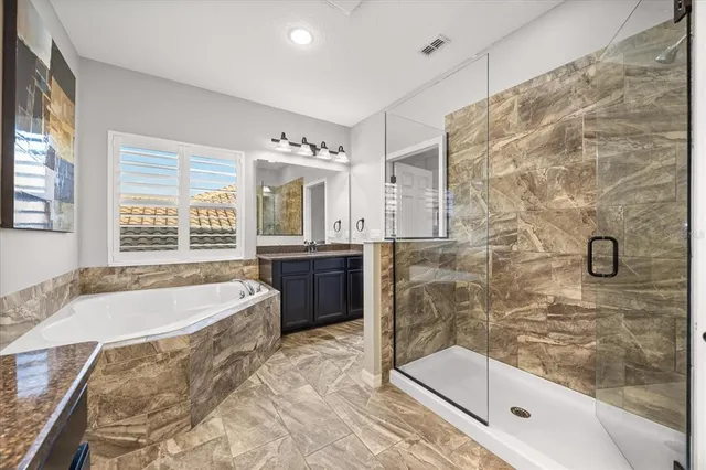 a view of a bathroom from a hallway