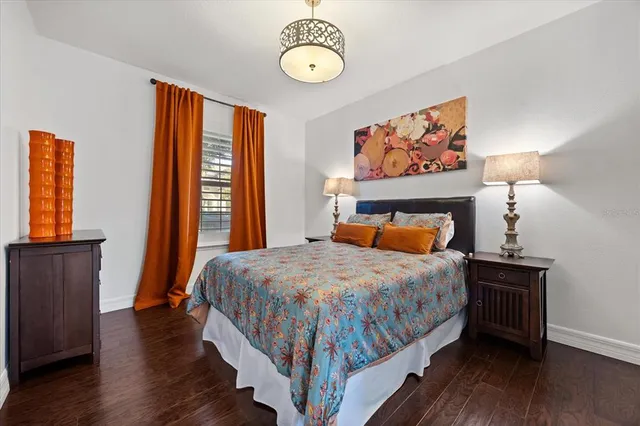 a living room with furniture window and wooden floor