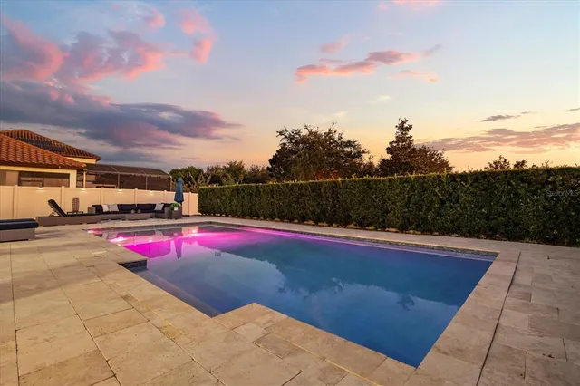 an aerial view of a swimming pool