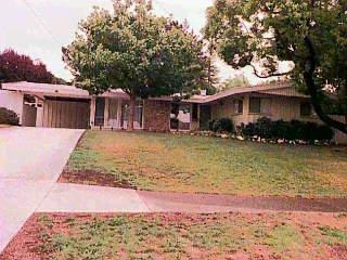 512 Las Colindas Road San Rafael, CA 94903 - Photo 1 of 1 a front view of a house with a yard