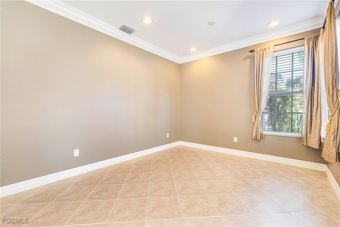 11196 Sand Pine Court Fort Myers, FL 33913 - Photo 3 of 49 a view of an empty room with a window