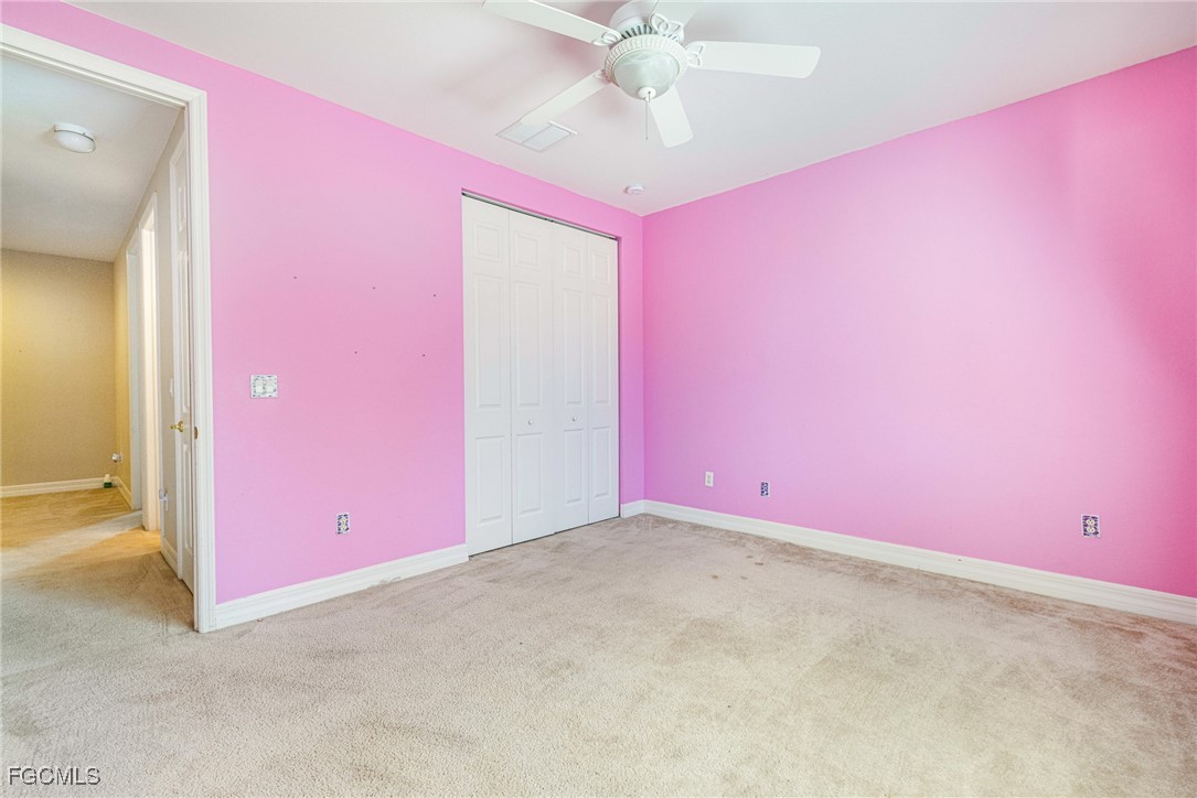 11196 Sand Pine Court Fort Myers, FL 33913 - Photo 31 of 49 an empty room with fan