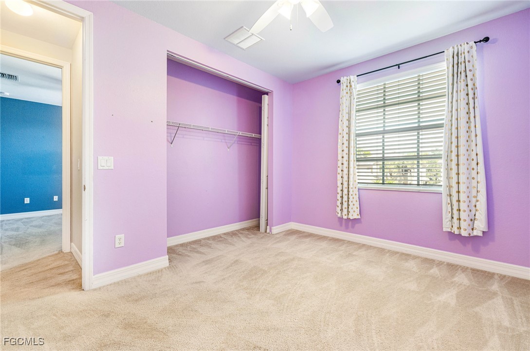 11196 Sand Pine Court Fort Myers, FL 33913 - Photo 34 of 49 an empty room with windows
