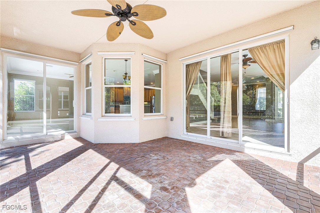 11196 Sand Pine Court Fort Myers, FL 33913 - Photo 38 of 49 a view of a room with wooden floor and balcony