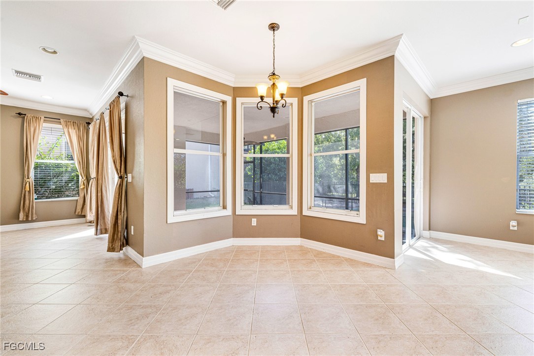 11196 Sand Pine Court Fort Myers, FL 33913 - Photo 4 of 49 a view of livingroom with furniture large windows and front door