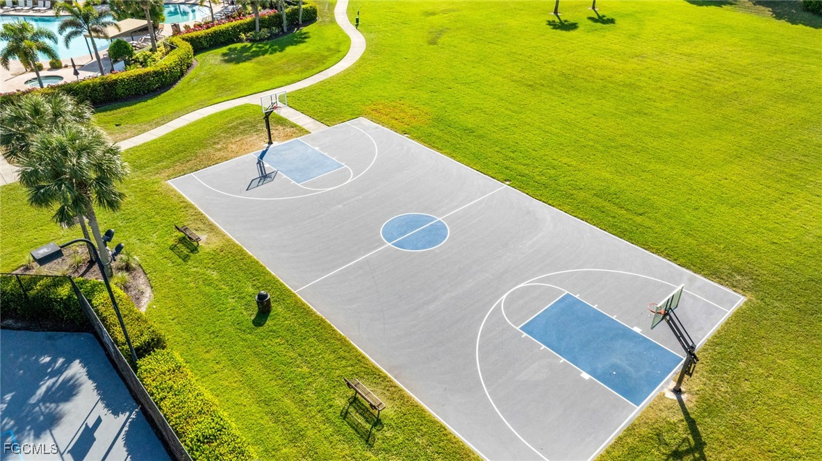 11196 Sand Pine Court Fort Myers, FL 33913 - Photo 48 of 49 a view of a swimming pool with a yard