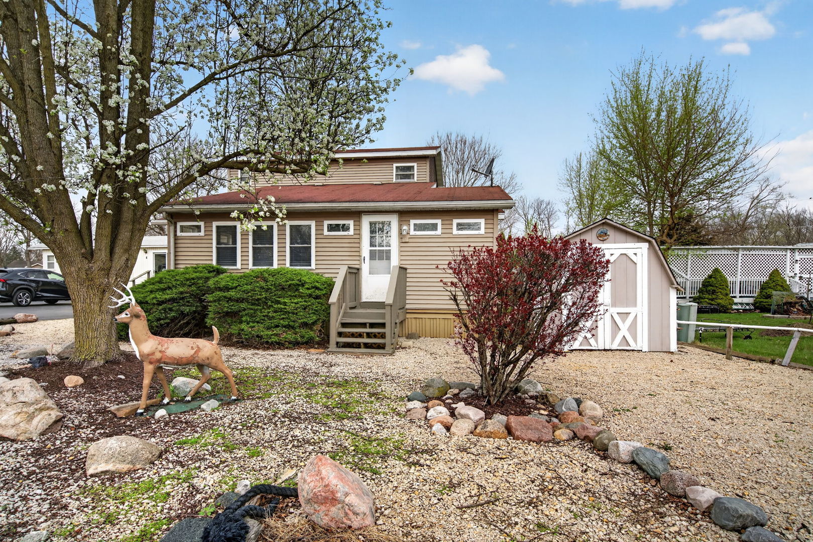 1 Largemouth Lane Wilmington, IL 60481 - Photo 2 of 47 a view of a house with backyard and sitting area