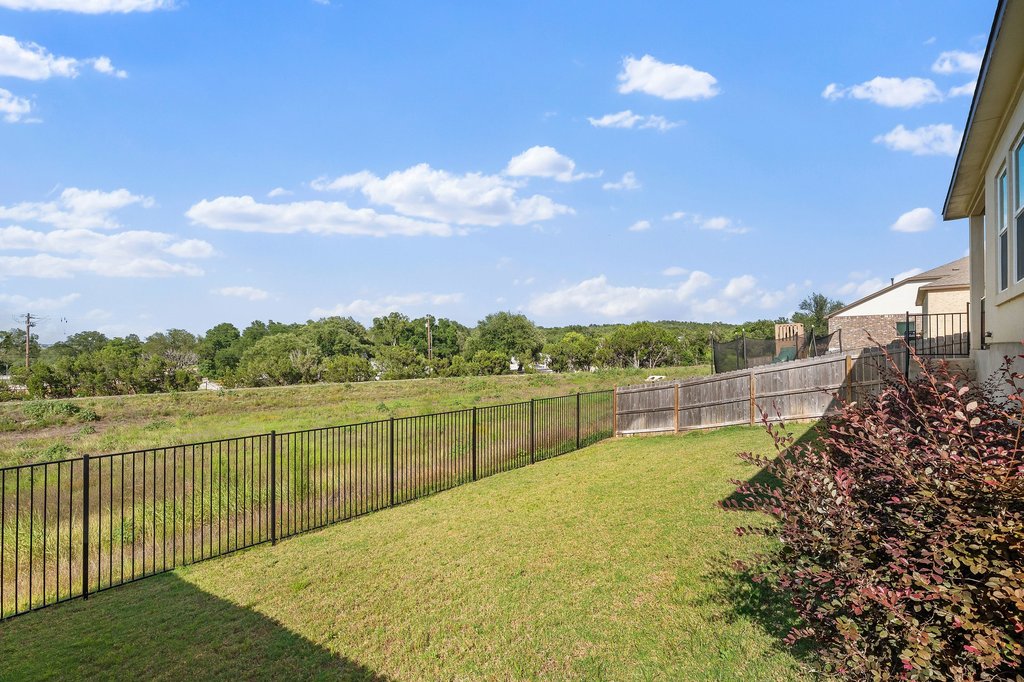 1233 Sweetspire Street Leander, TX 78641 - Photo 31 of 40 Wide open spaces and an ideal orientation for backyard enjoyment all year long!