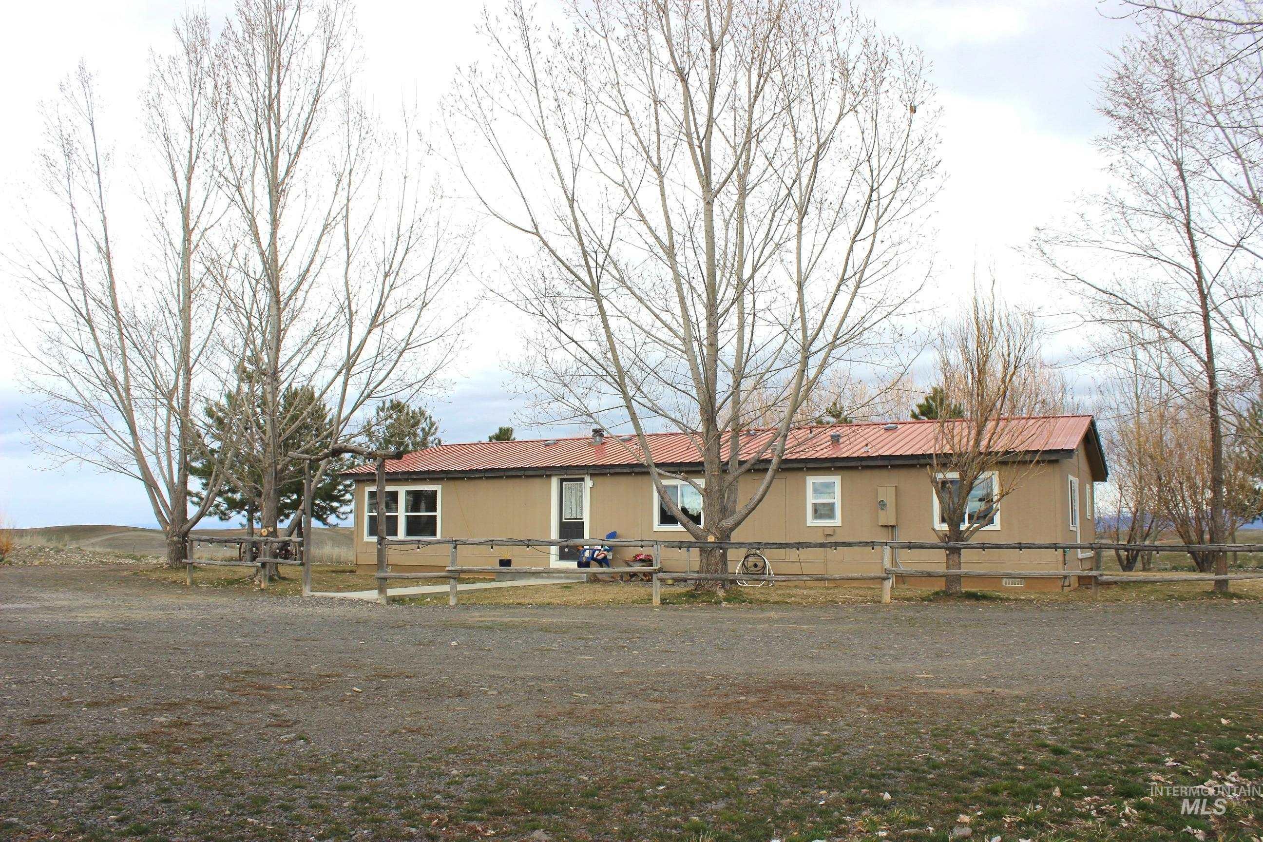 1824 Dutch Flat Road Midvale, ID 83645 - Photo 3 of 39 Front of property with a fenced front yard and a metal roof