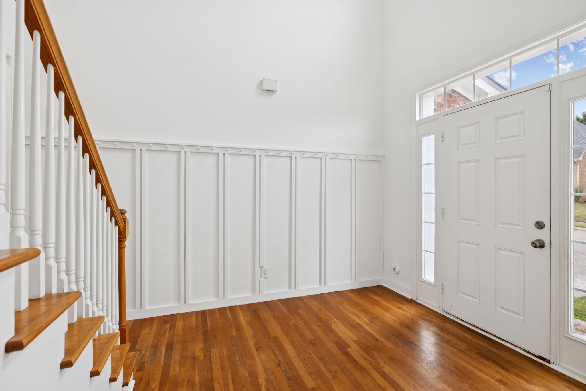 2015 Keene Circle Spring Hill, TN 37174 - Photo 3 of 37 a view of hallway with wooden floor and stairs
