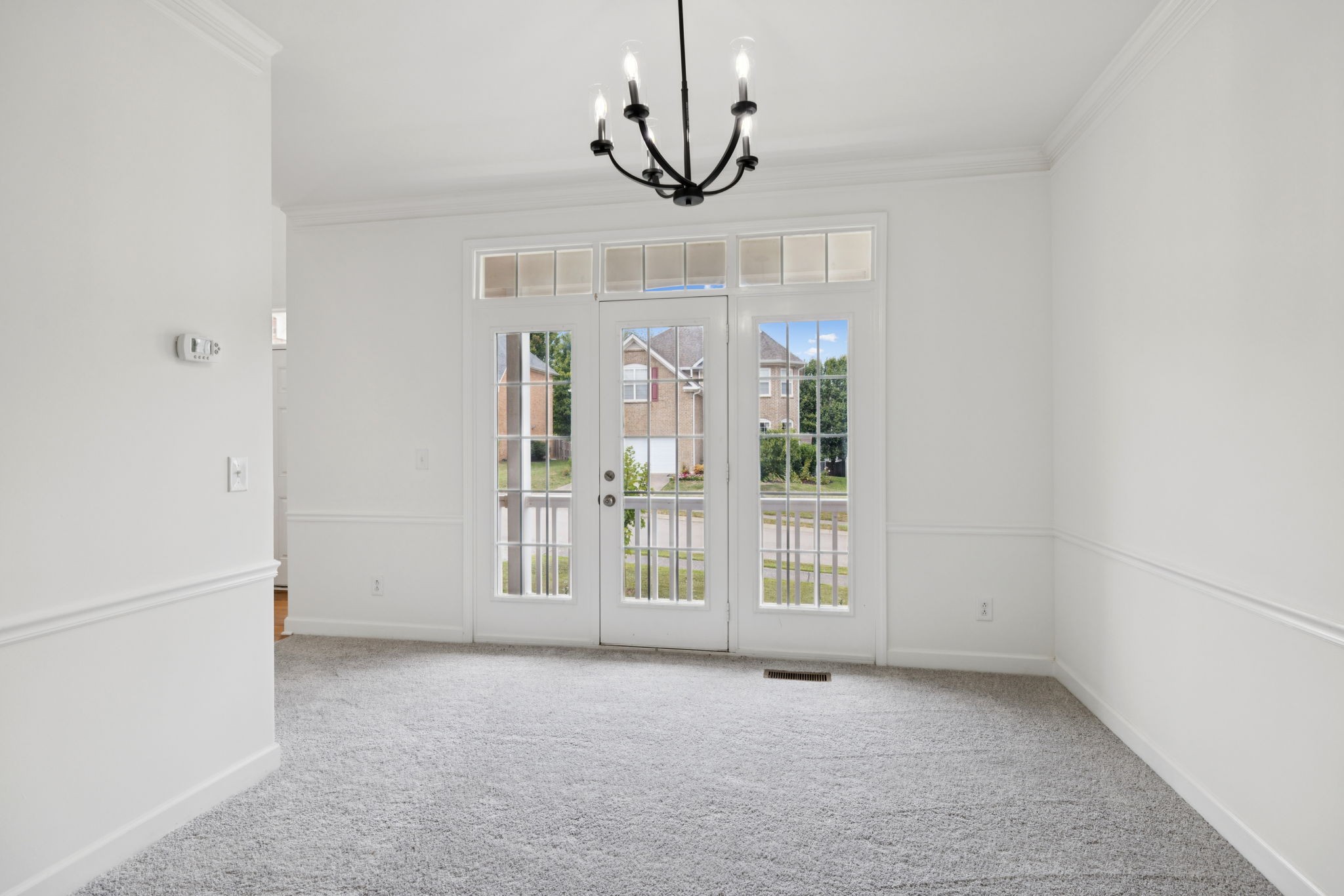 2015 Keene Circle Spring Hill, TN 37174 - Photo 6 of 37 a view of an empty room with a chandelier