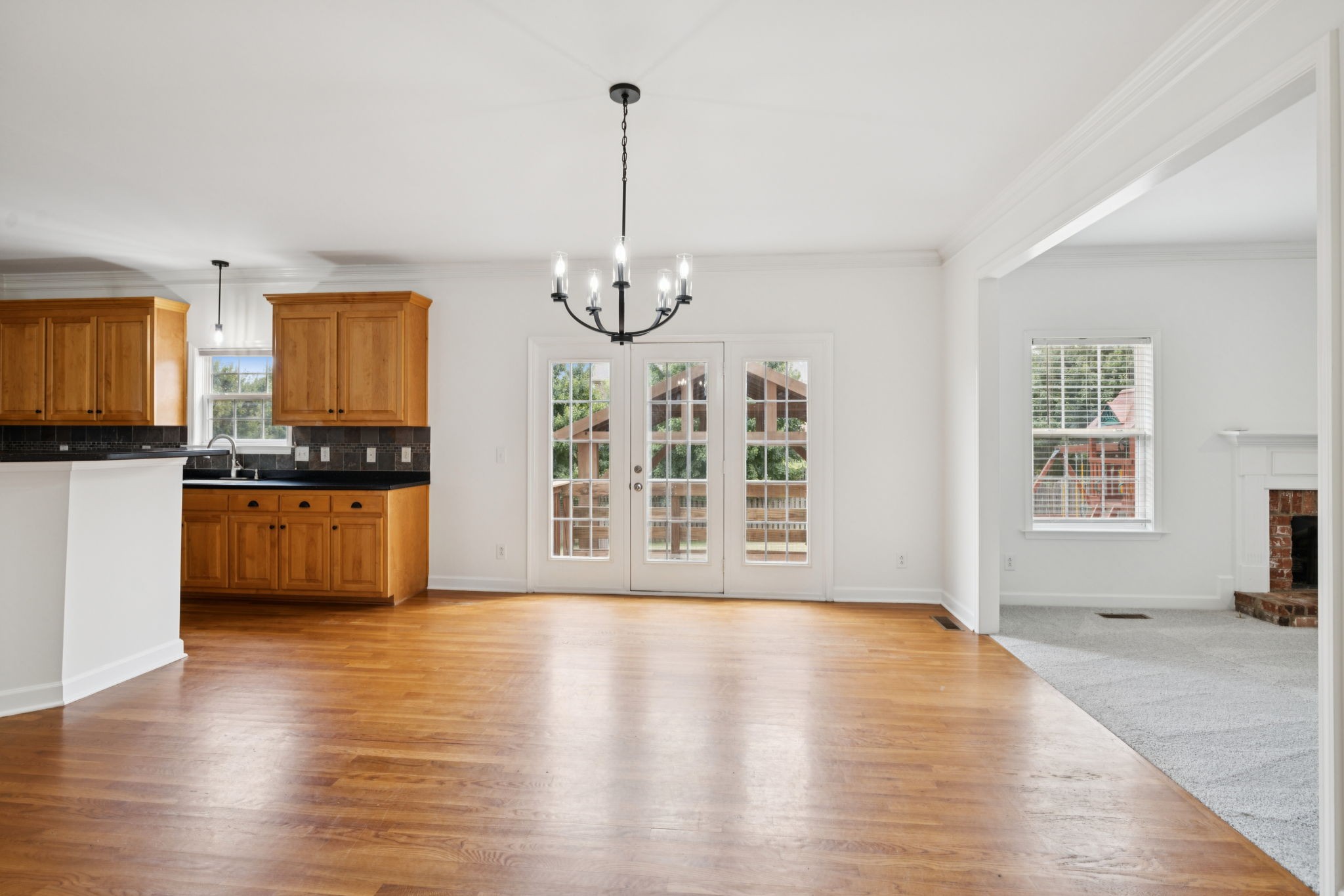 2015 Keene Circle Spring Hill, TN 37174 - Photo 10 of 37 a view of an empty room with a window and wooden floor