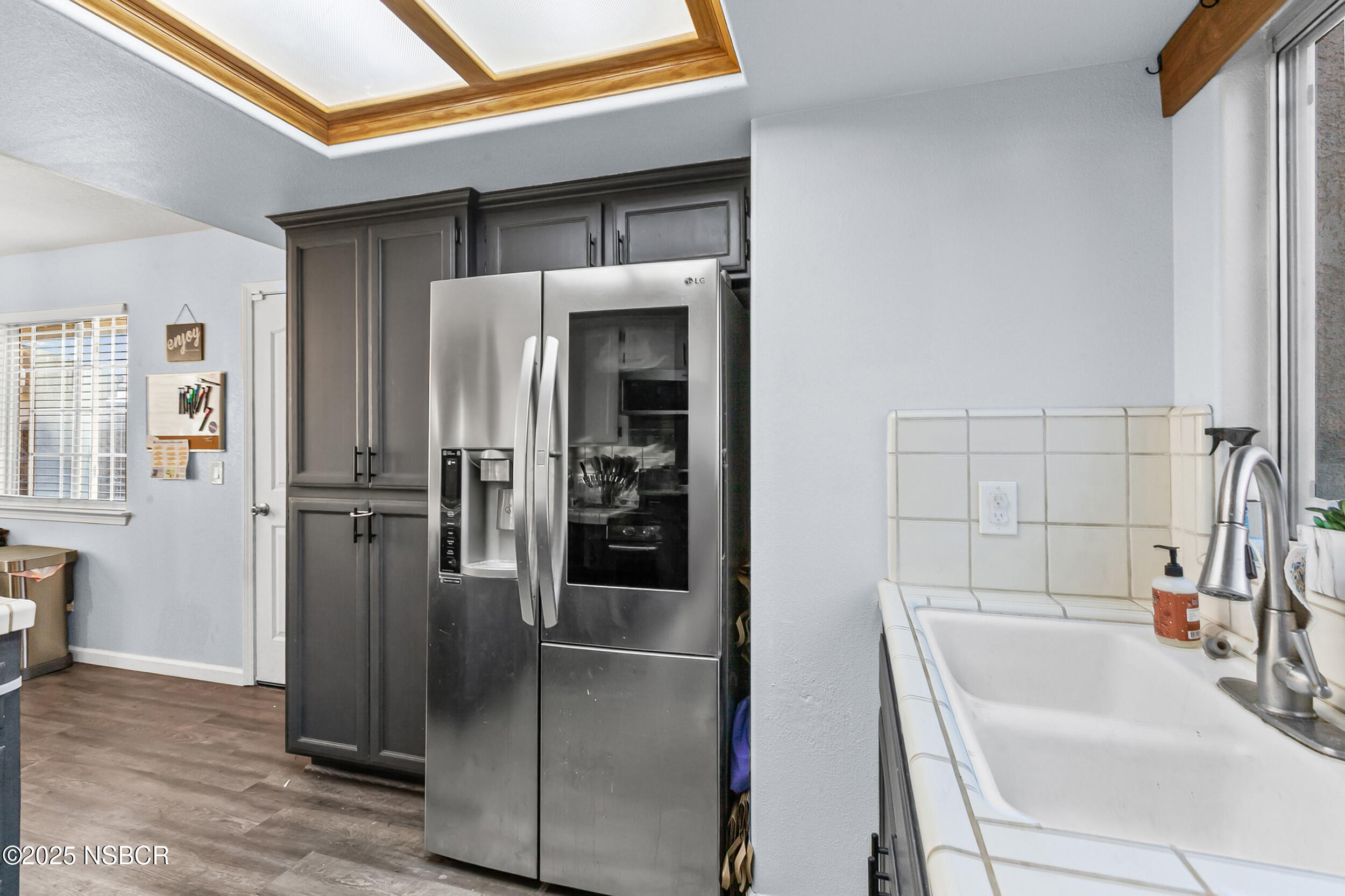 2442 Acacia Street Santa Maria, CA 93458 - Photo 8 of 27 a bathroom with a tub and a sink