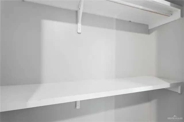 a bathroom with a sink toilet vanity and bathtub