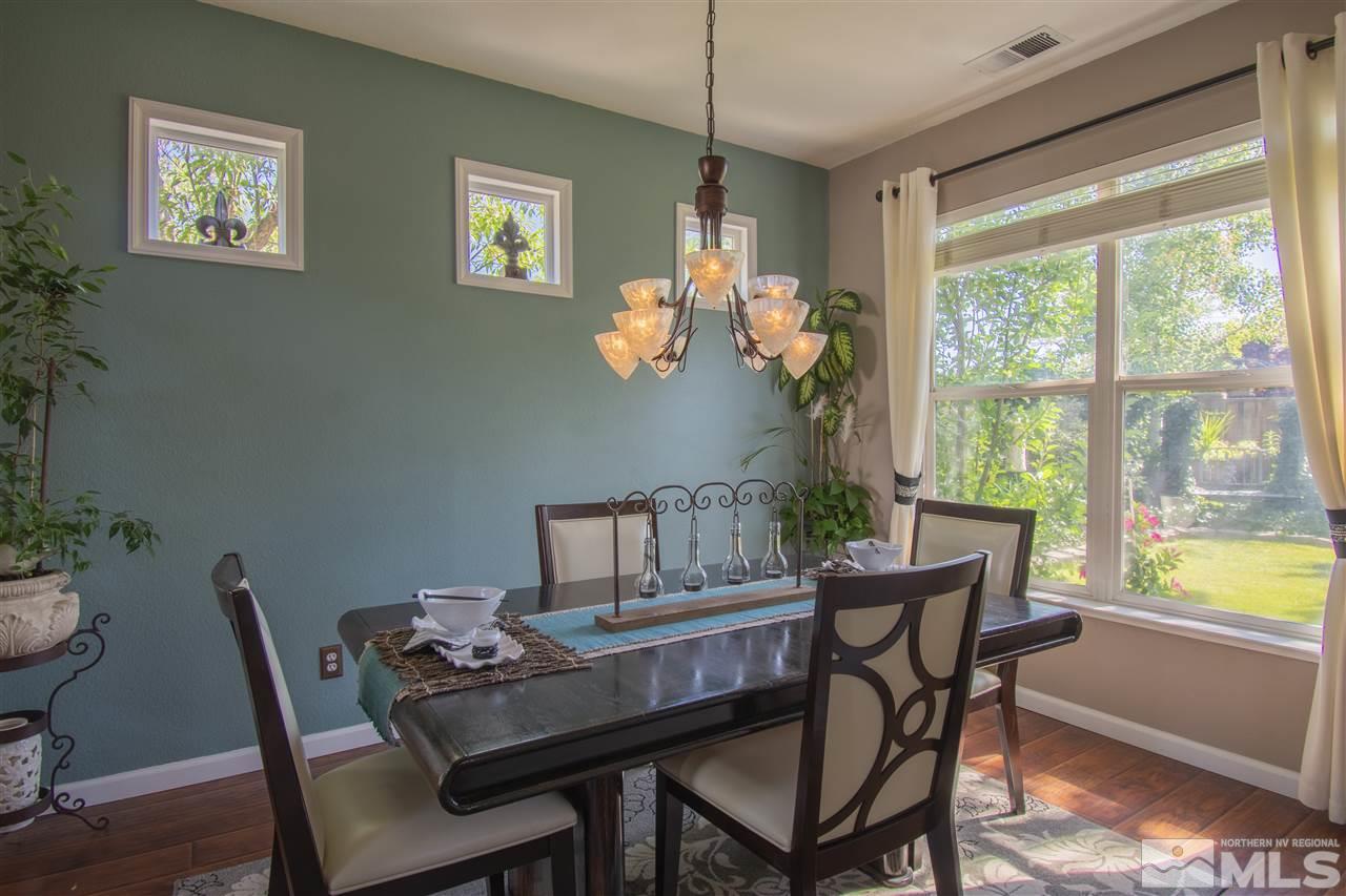 9621 Apache Rose Court Reno, NV 89521 - Photo 7 of 25 a dining room with furniture and window