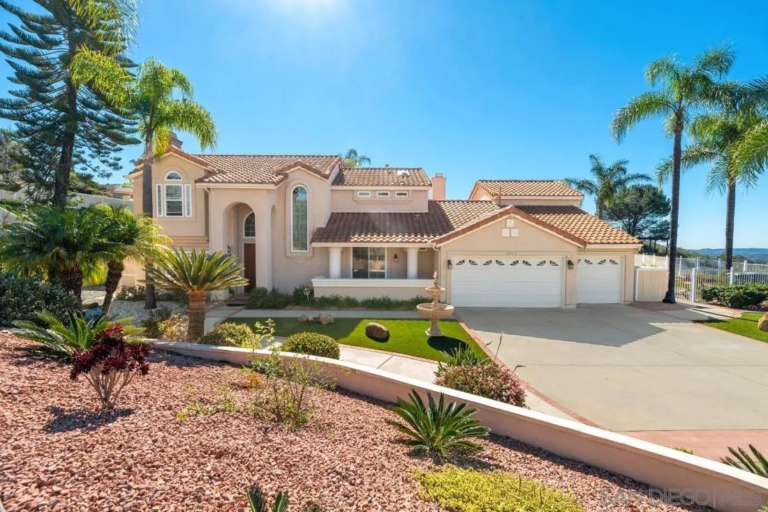 14513 Wildgrove Road Poway, CA 92064 - Photo 1 of 39 a front view of house with yard and swimming pool