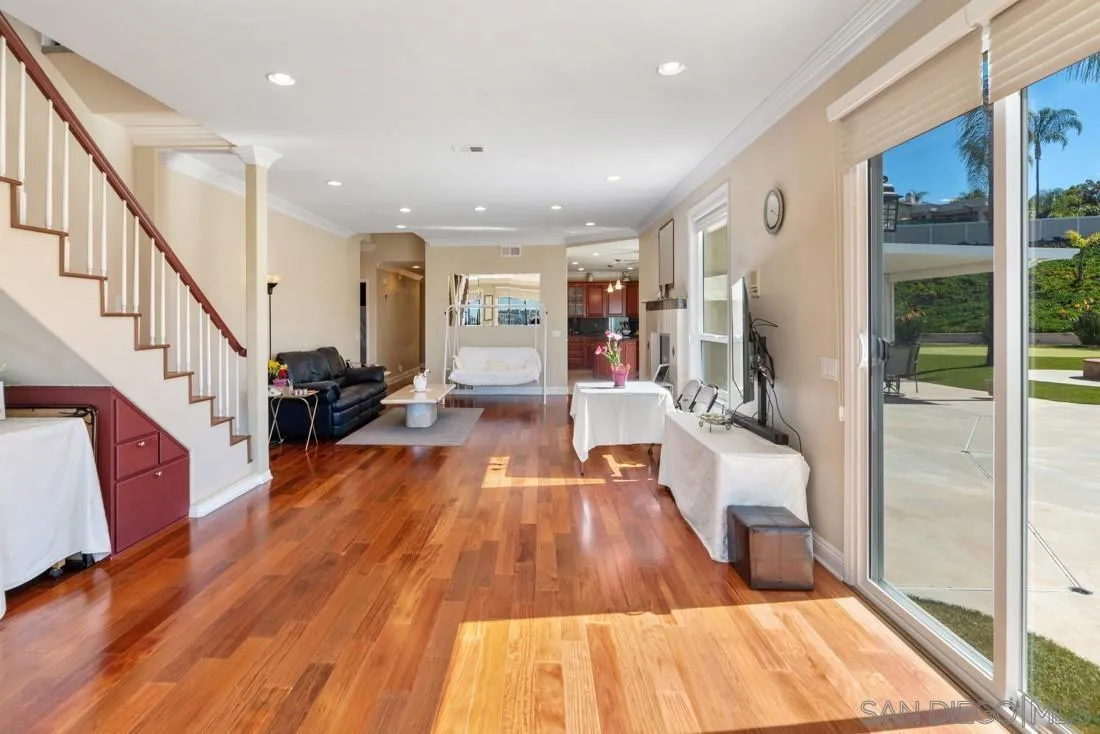 14513 Wildgrove Road Poway, CA 92064 - Photo 17 of 39 a living room with furniture and a wooden floor