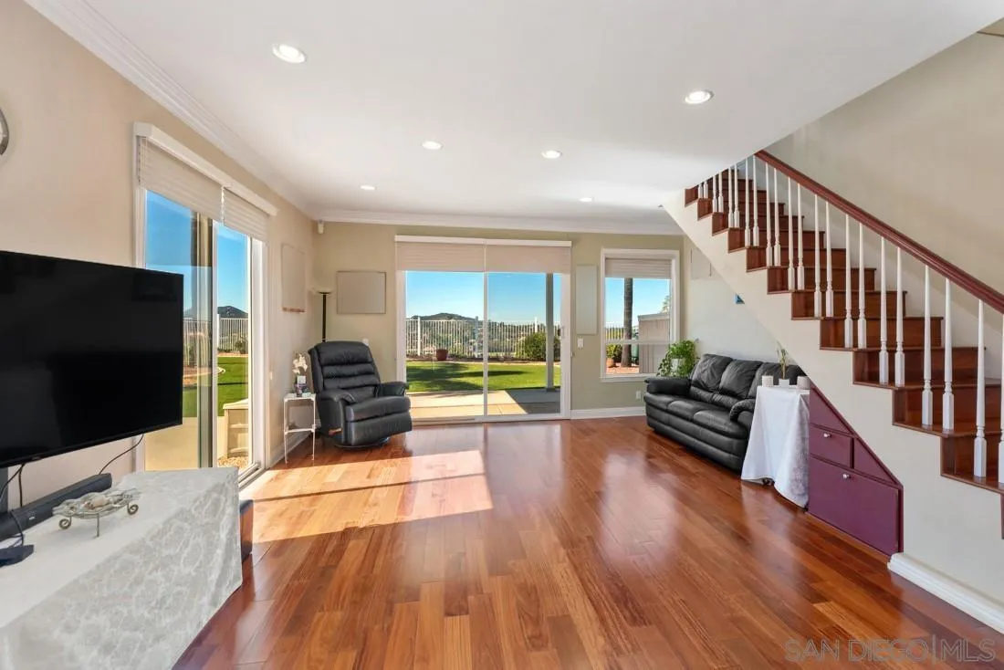 14513 Wildgrove Road Poway, CA 92064 - Photo 18 of 39 a living room with furniture and a flat screen tv