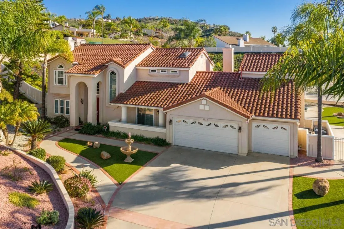 14513 Wildgrove Road Poway, CA 92064 - Photo 2 of 39 a view of a house with a swimming pool