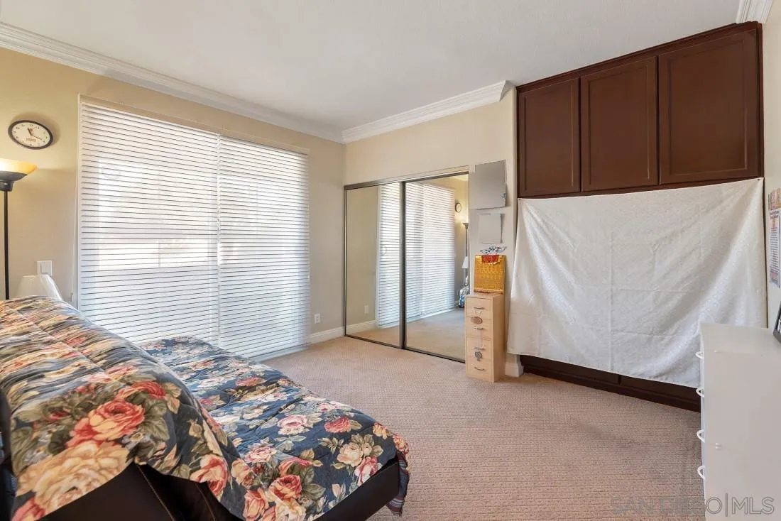 14513 Wildgrove Road Poway, CA 92064 - Photo 21 of 39 a bedroom with a bed and a window