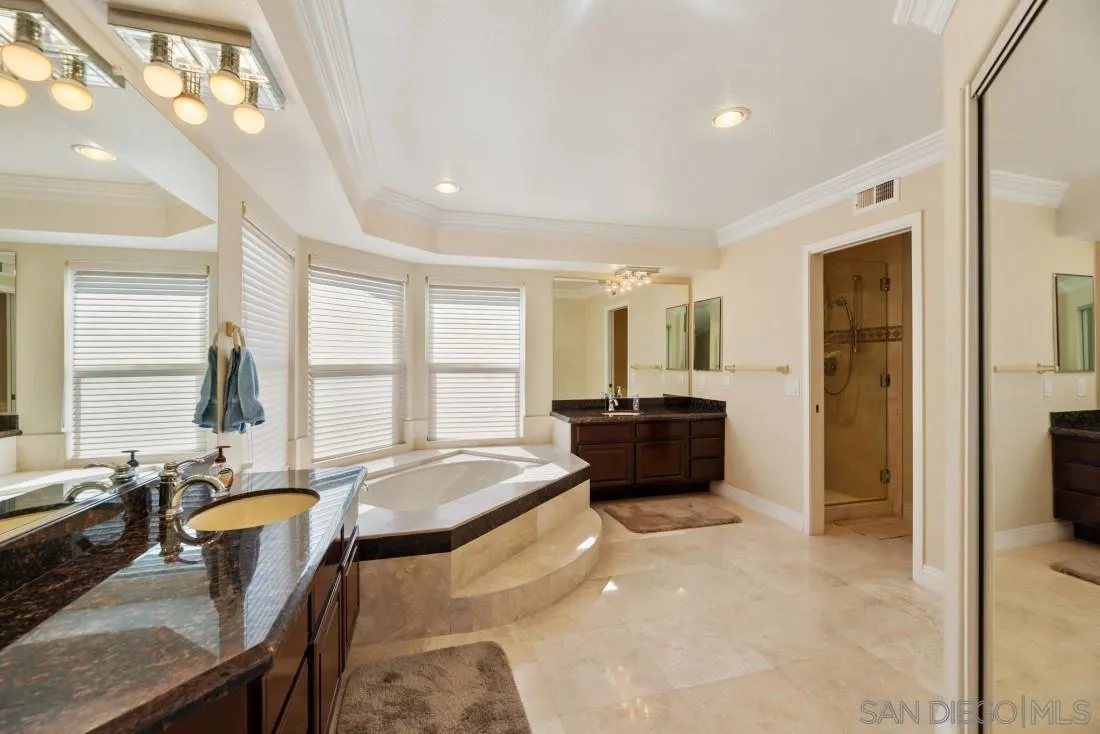 14513 Wildgrove Road Poway, CA 92064 - Photo 24 of 39 a large living room with a large window and couch