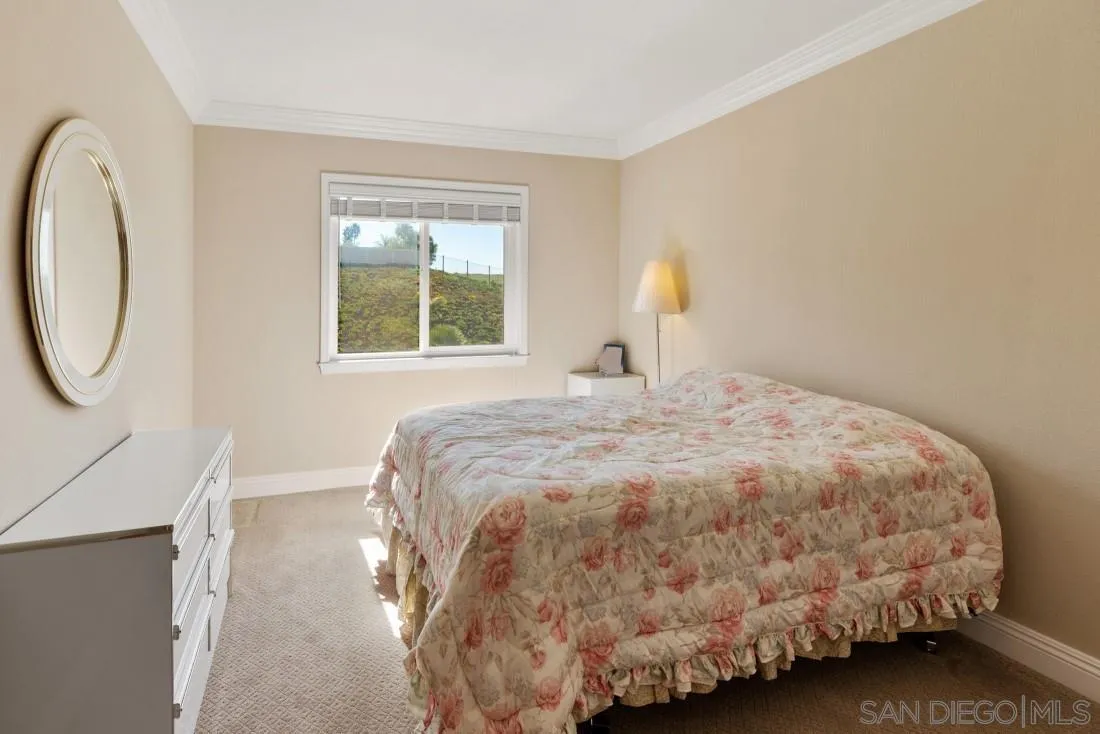 14513 Wildgrove Road Poway, CA 92064 - Photo 26 of 39 a bedroom with a bed and a window